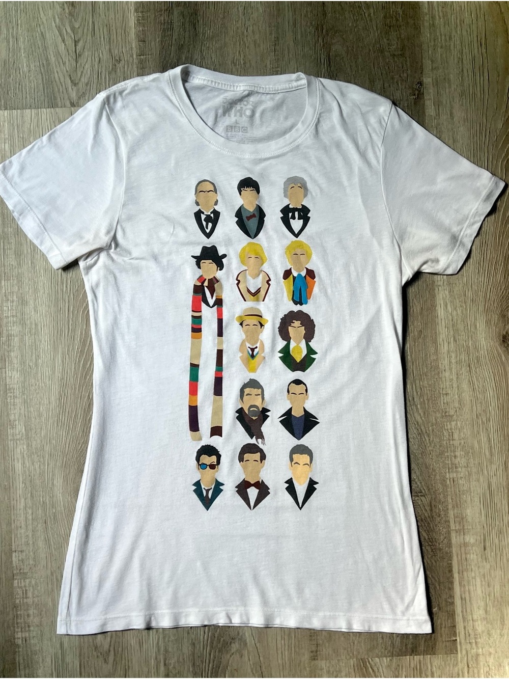 Hot Topic White Short‑Sleeve Tee with Multicolor Character Icons